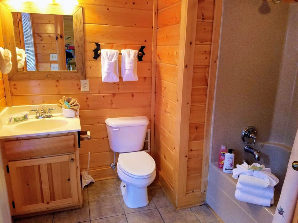 Top level, loft, full bathroom with shower tub combination
