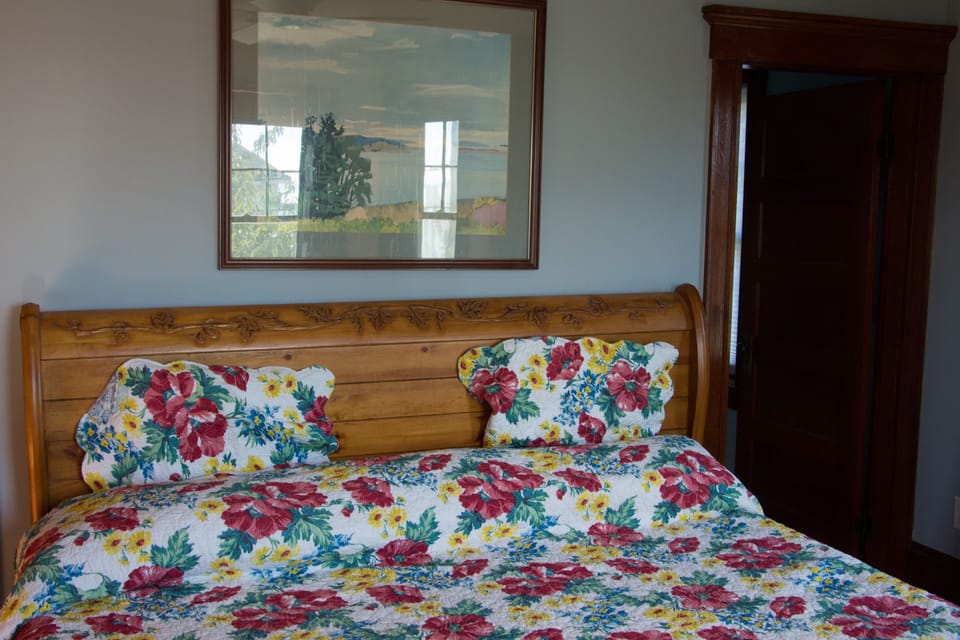 Master bedroom; antique maple King bed