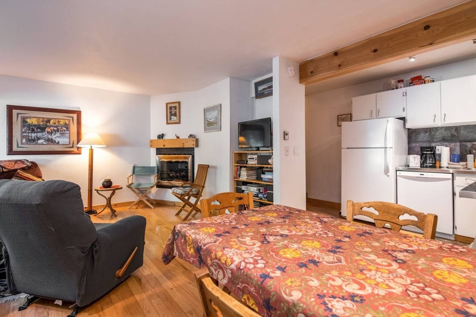 Designer lighting and warm wood finishes create an inviting space you won’t want to leave.