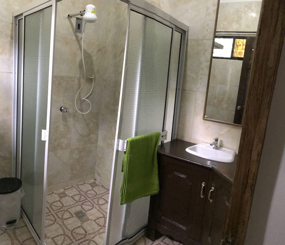 Deluxe Loft, Multiple Beds, Non Smoking, Garden View | Bathroom | Shower, free toiletries, hair dryer (on request), bidet
