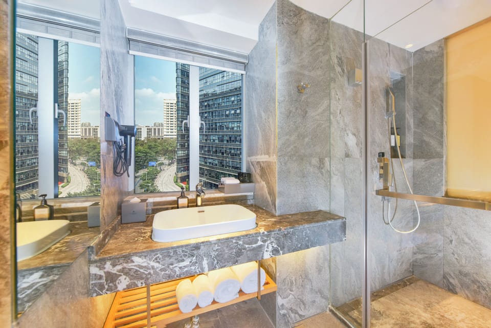Superior King | Bathroom | Shower, free toiletries, bathrobes, slippers