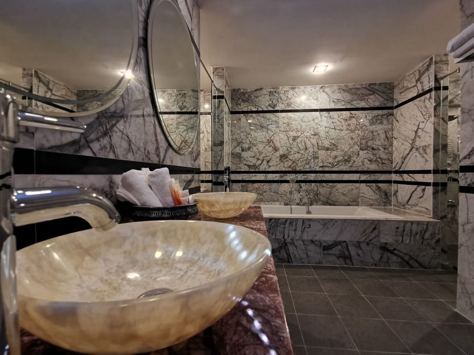 Chanthapanya Suite | Bathroom | Shower, free toiletries, slippers, bidet
