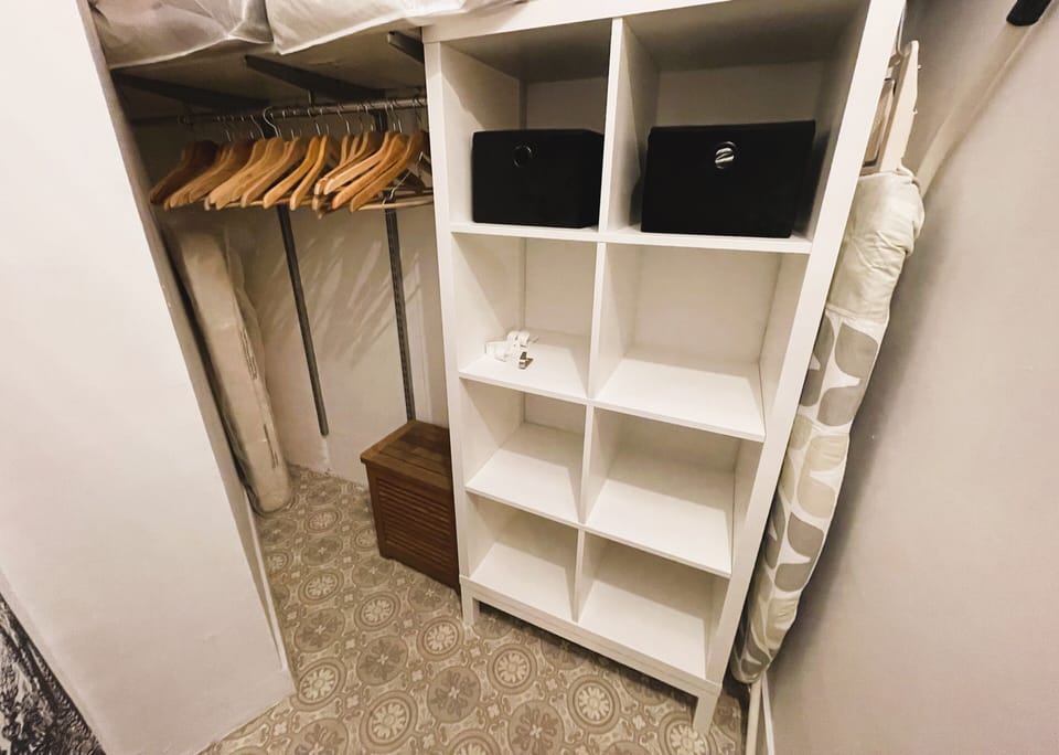 Dressing with iron board and steamer unit
