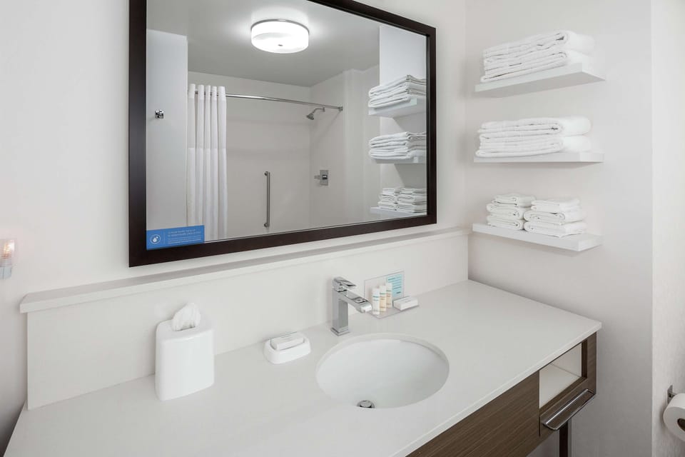 Shower, eco-friendly toiletries, hair dryer, towels