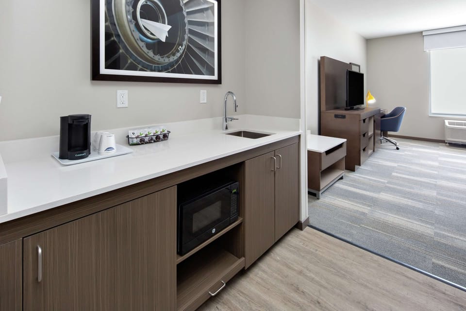 Suite, 1 King Bed, Accessible (Hearing) | Private kitchen | Mini-fridge, microwave, coffee/tea maker, eco-friendly cleaning products