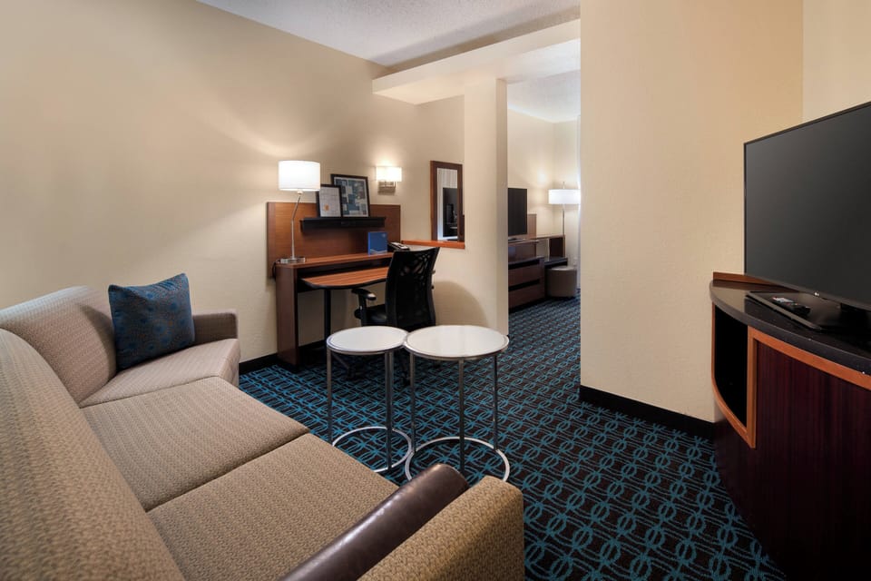 Studio Suite, 1 King Bed with Sofa bed | Living area | Flat-screen TV