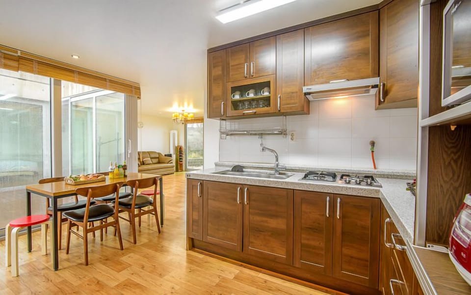 Family Room | Private kitchen | Fridge, microwave, electric kettle, rice cooker