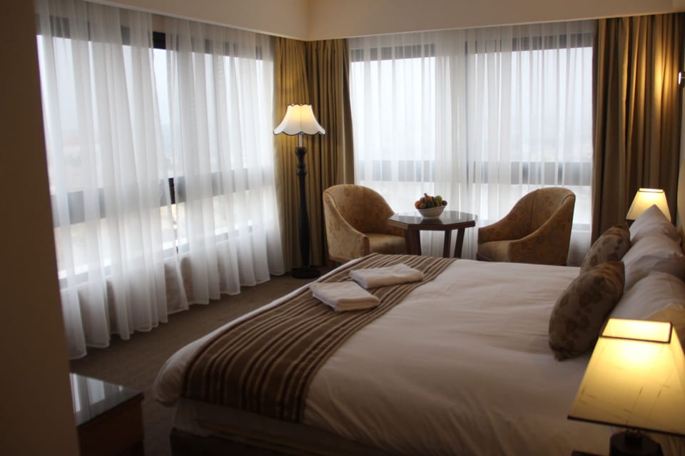 Premium Room | In-room safe, iron/ironing board (on request), cribs (free)