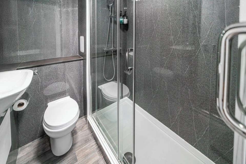 Shower, free toiletries, hair dryer, towels
