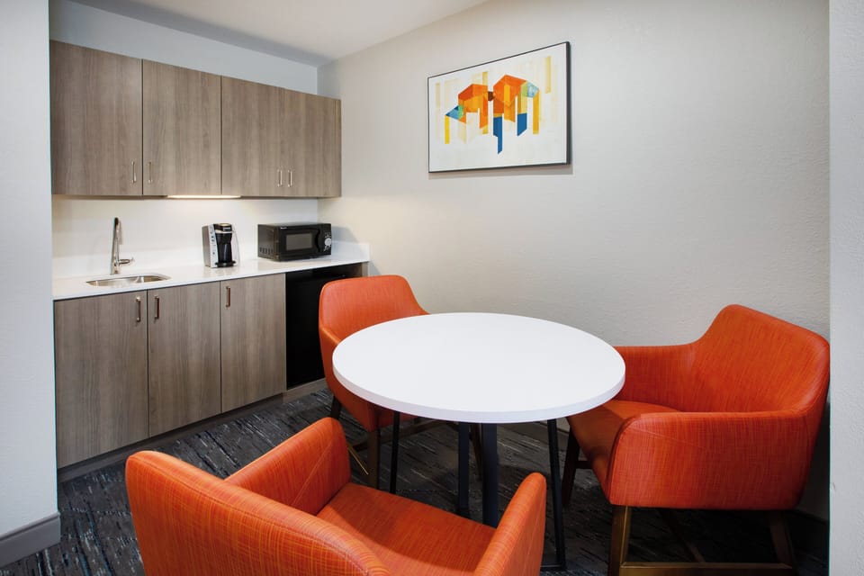 Suite, 1 King Bed, Mobility Accessible (Comm, Mobil Roll In Shwr) | Desk, iron/ironing board, cribs/infant beds, rollaway beds