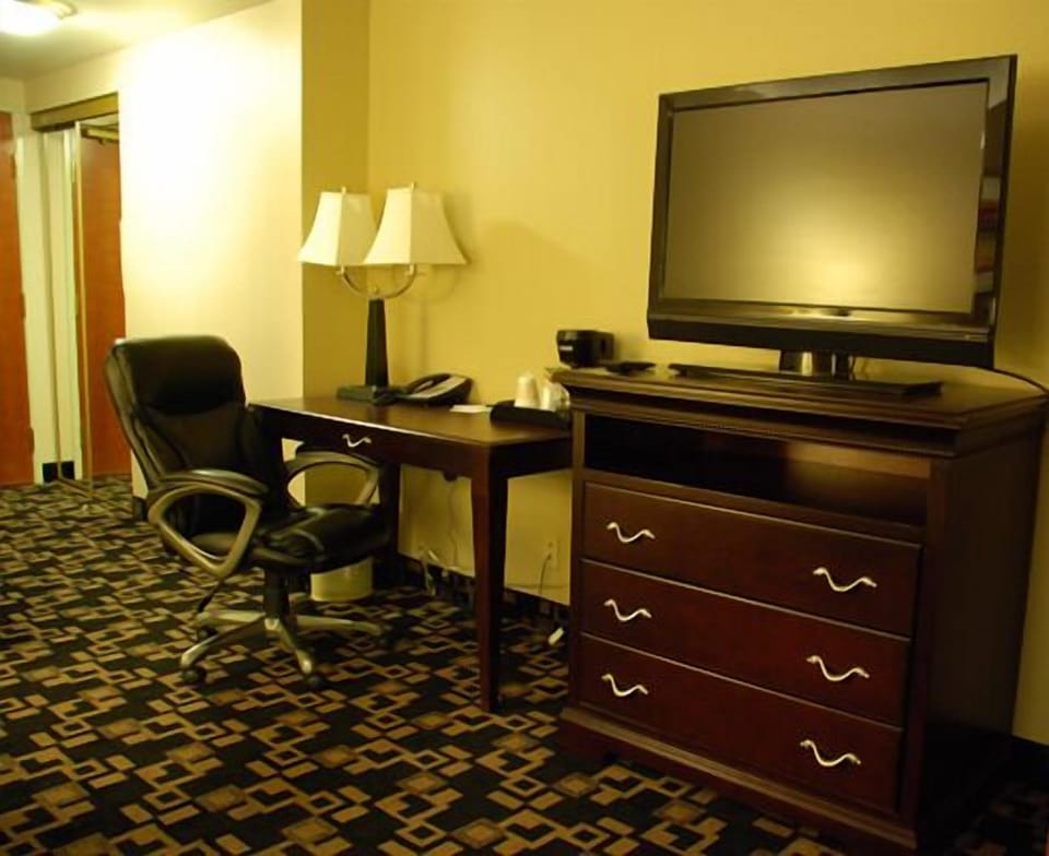 Family Suite, 1 Bedroom | Blackout drapes, iron/ironing board, free cribs/infant beds
