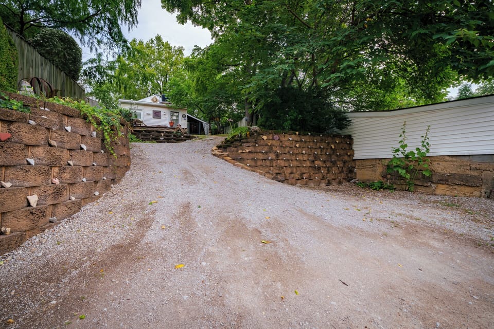 Park on the raised flat area or back onto ramp.