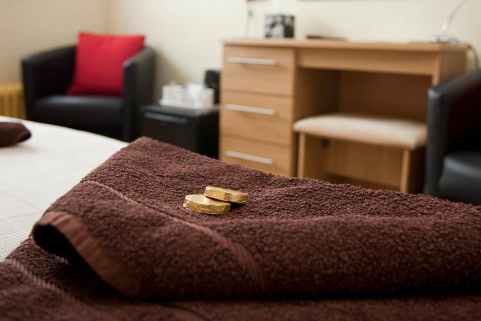 Premium bedding, minibar, blackout drapes, iron/ironing board
