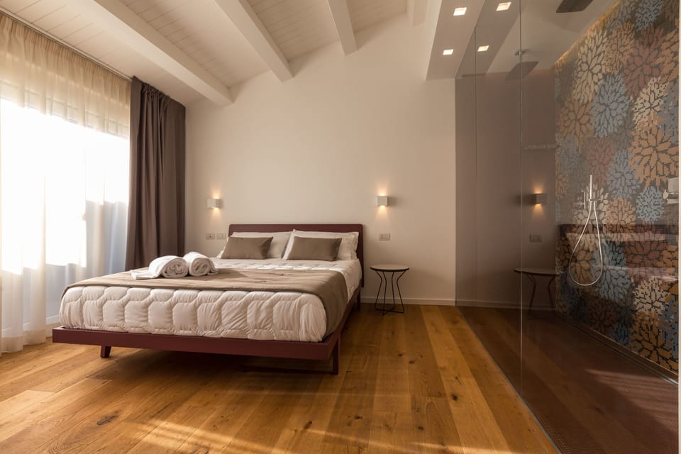Junior Suite, 1 Queen Bed, Terrace | Frette Italian sheets, premium bedding, down comforters, minibar