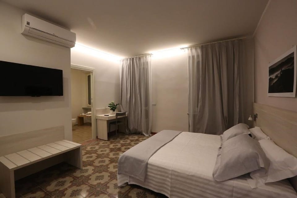 Double or Twin Room, Balcony | In-room safe, desk, free WiFi, bed sheets