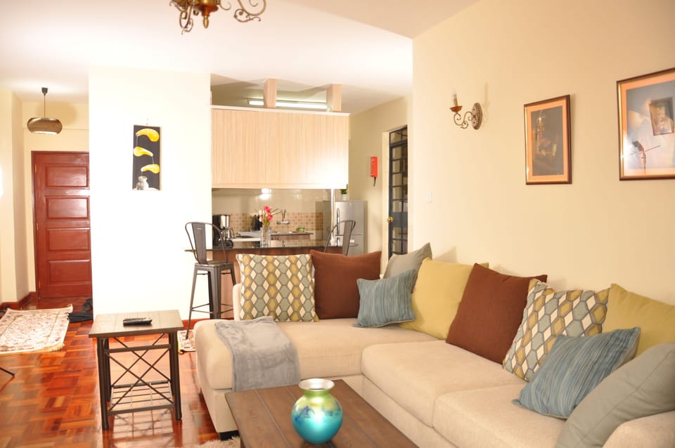 Comfort Apartment, 1 Queen Bed, Non Smoking | Living room | 40-inch TV with satellite channels, Netflix, streaming services