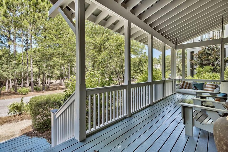 The front porch has a lovely swing and adirondack chairs-perfect for watching the kids ride their bikes