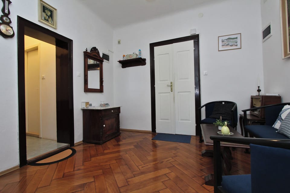 Apartment, 1 Bedroom | Living area | Flat-screen TV
