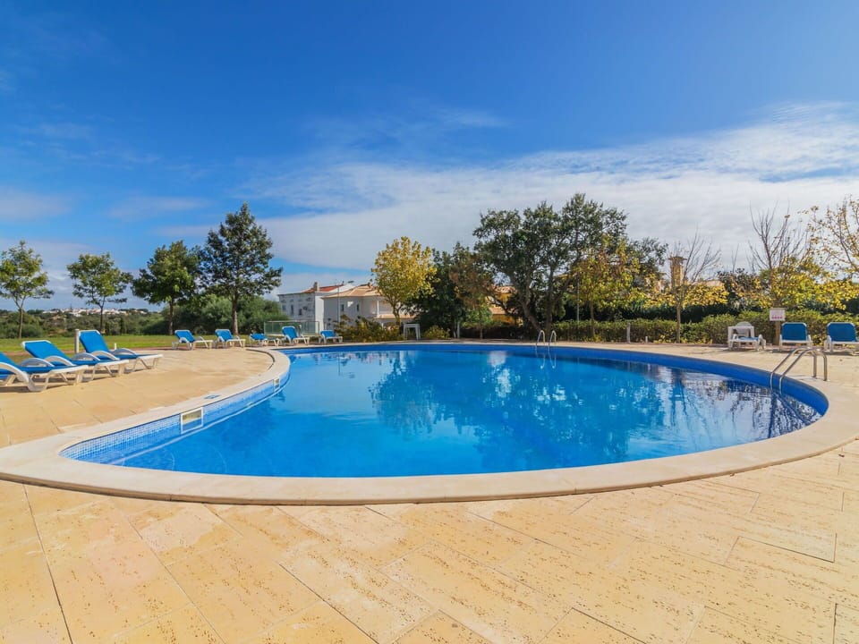 Swimming Pool, Property, Real Estate, Sky, Leisure, Water, Vacation, Tree, House, Resort