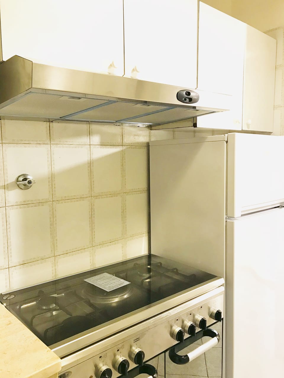 Family Apartment, 4 Bedrooms, Kitchen, City View | Shared kitchen | Shared fridge, microwave, oven, stovetop
