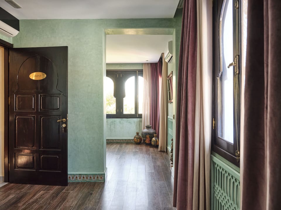 JAIPUR SUITE | Living area | 43-inch flat-screen TV with satellite channels