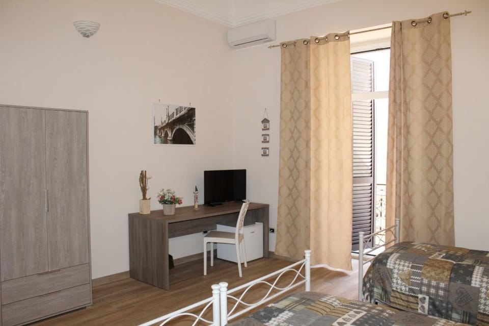 Comfort Room, Private Bathroom | Individually decorated, individually furnished, desk, iron/ironing board