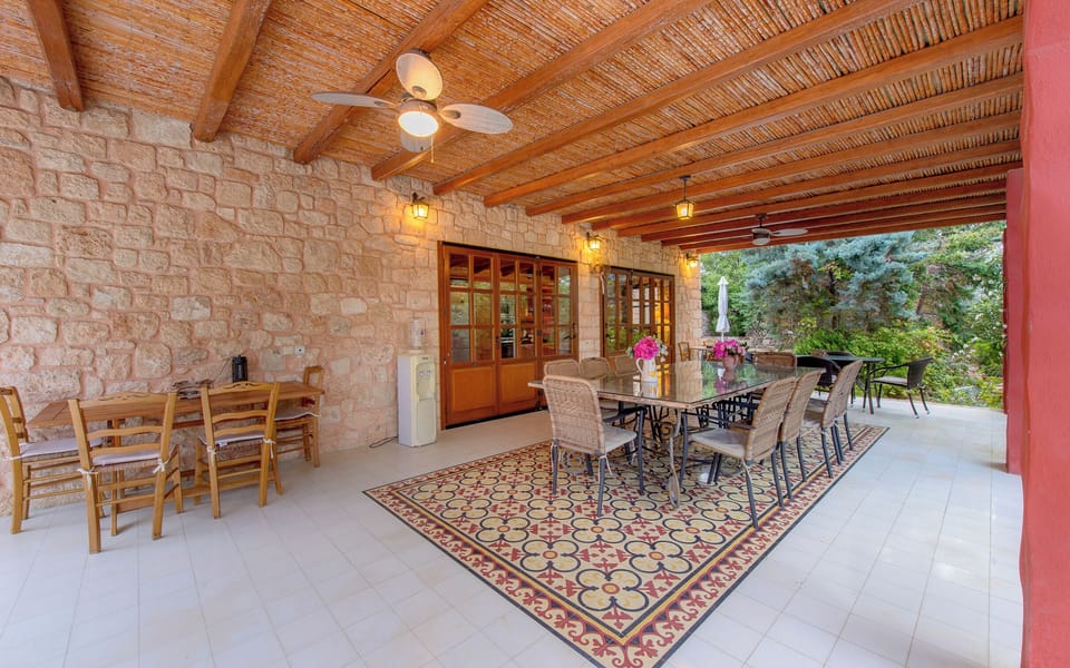 Dining room for 18 people in front of the central kitchen