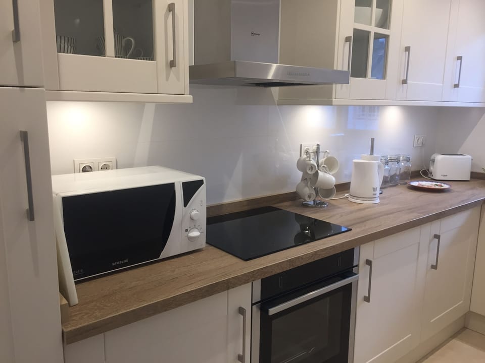 High spec appliances - washing machine, fridge/freezer, microwave, oven & hob.