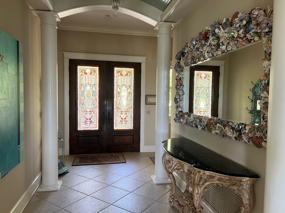 Antique stained glass front door entrance.  One of a kind!