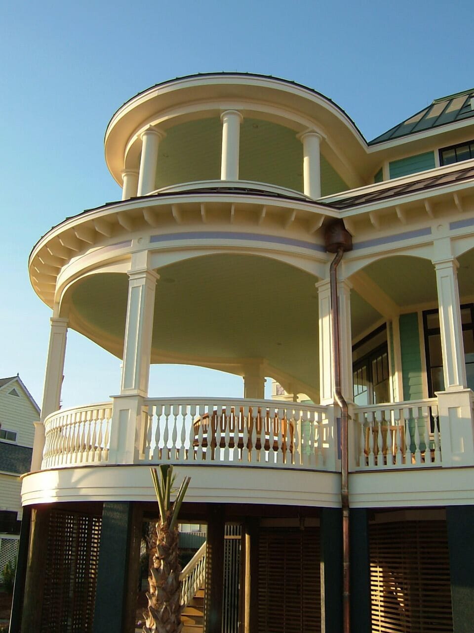 Two of Five oceanfront porches. Bottom porch off kitchen. Teak table six chairs