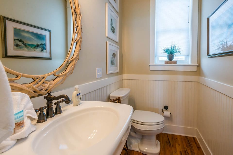 Powder room off of the living room.