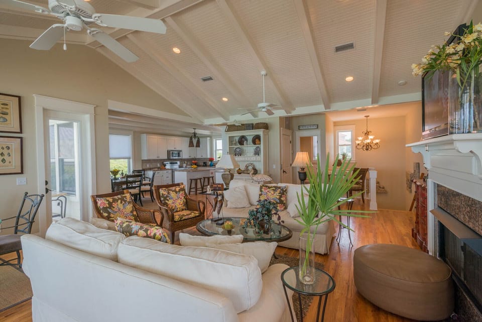 Upstairs living room with plenty of seating and open floor plan.
