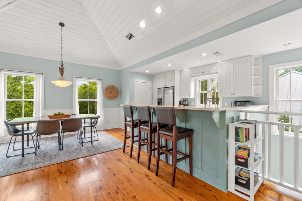 Dining area with bar stools for more seating.