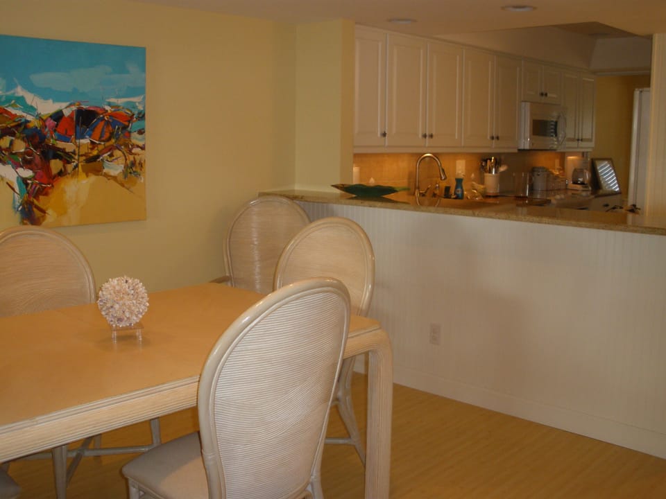 Dining area looking into kitchen