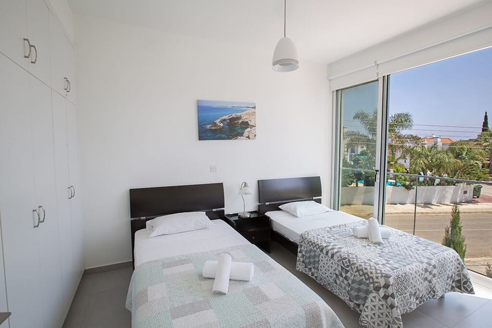 Bedroom 5, first floor with two single beds