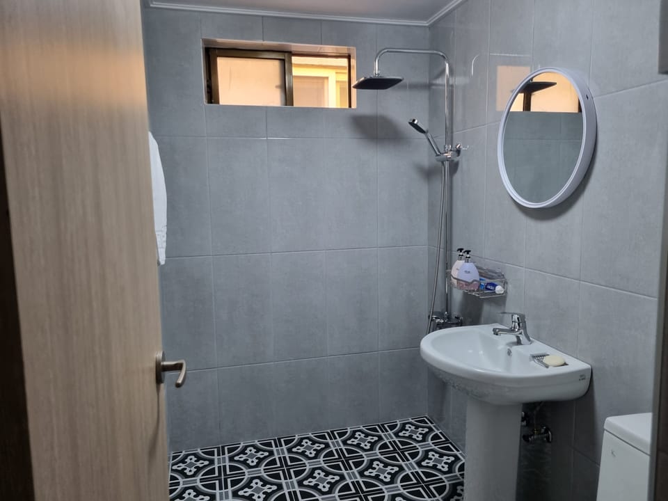 Shower, free toiletries, hair dryer, slippers