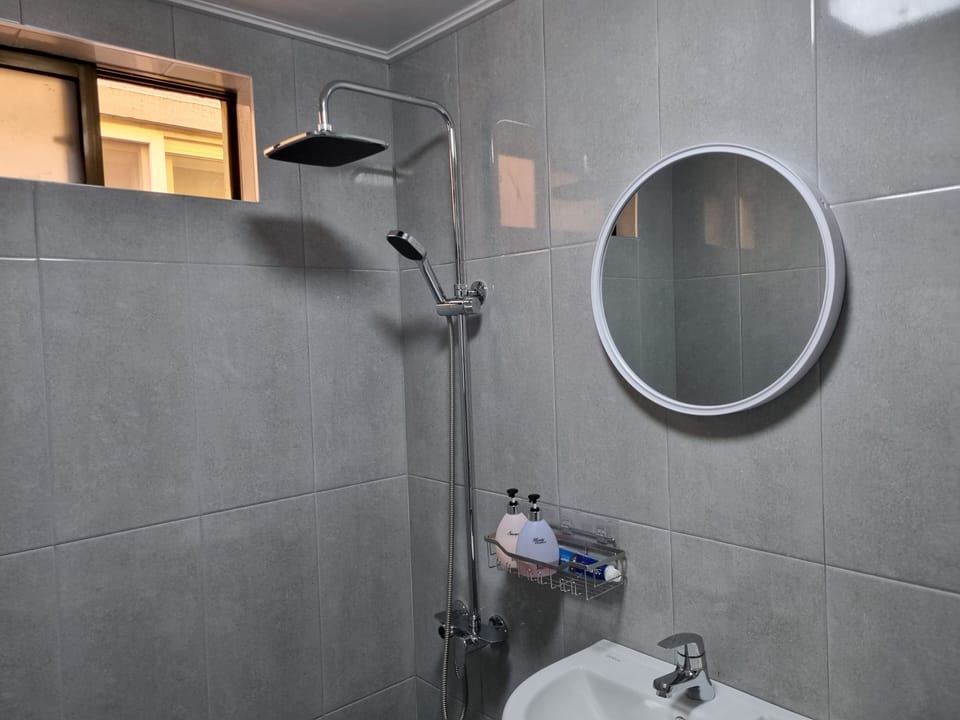 Shower, free toiletries, hair dryer, slippers