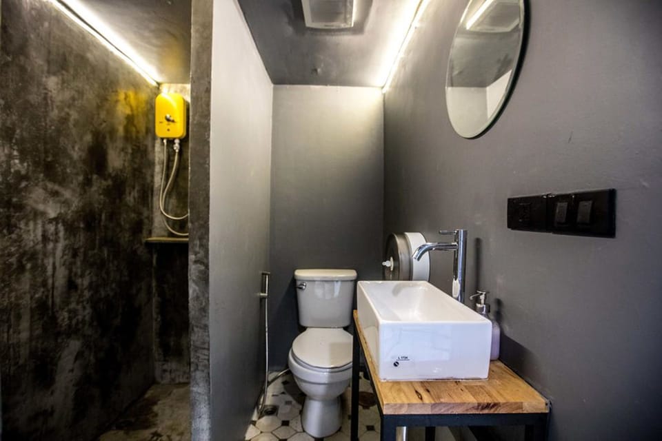 Capsule with Shared Bathroom | Bathroom | Shower, towels