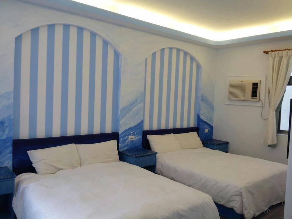 Standard Quadruple Room | Desk, blackout drapes, soundproofing, free WiFi