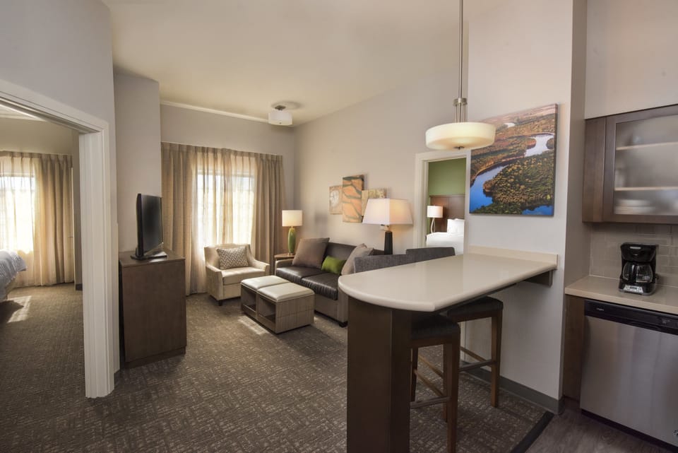 Premium bedding, pillowtop beds, desk, laptop workspace