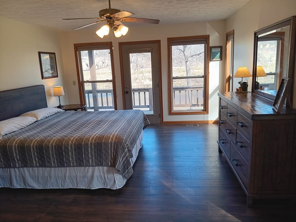 Master bedroom with king bed with all new flooring 