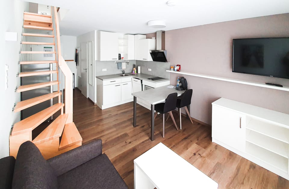 Apartment (Split Level) | Living area | Flat-screen TV