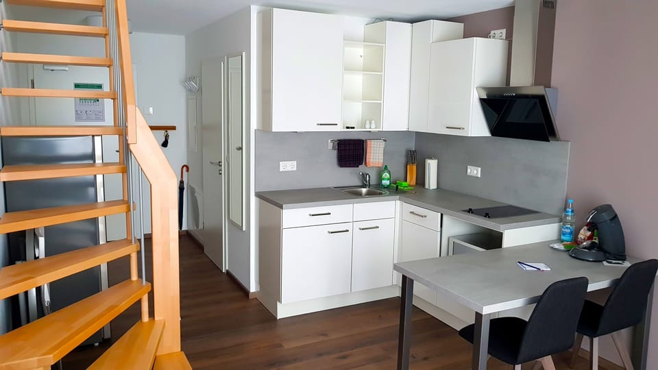 Apartment (Split Level) | Private kitchen | Full-size fridge, microwave, stovetop, dishwasher
