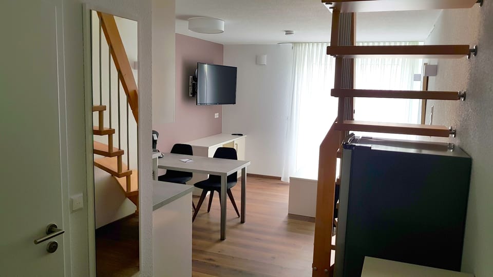 Apartment (Split Level) | Living area | Flat-screen TV