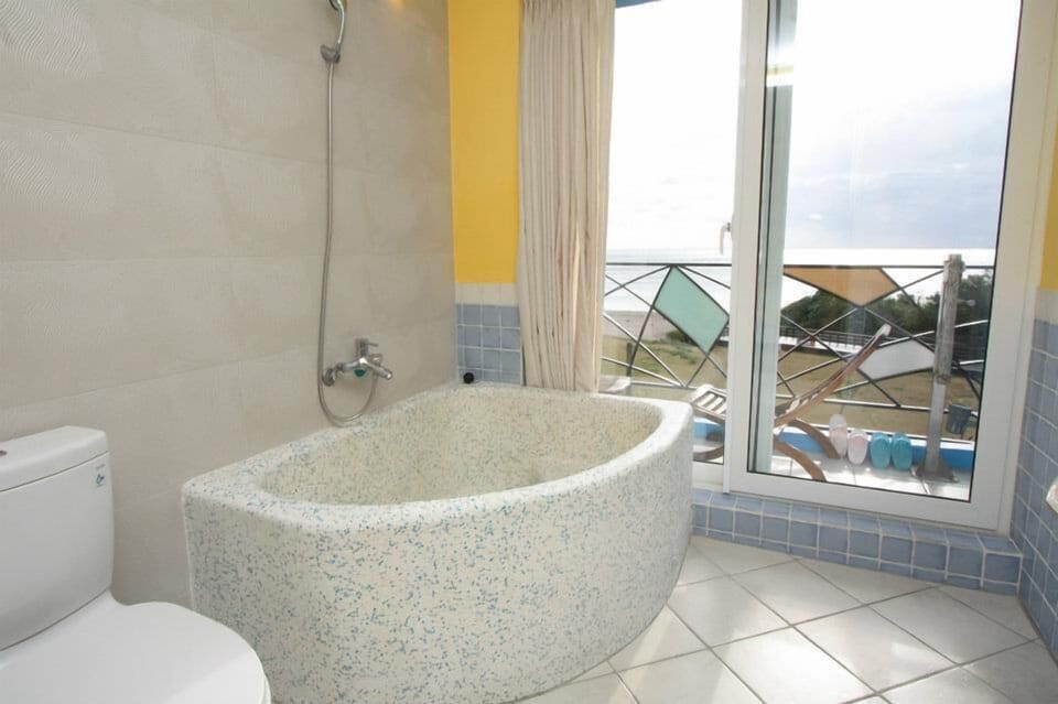 Hair dryer, slippers, towels, shampoo