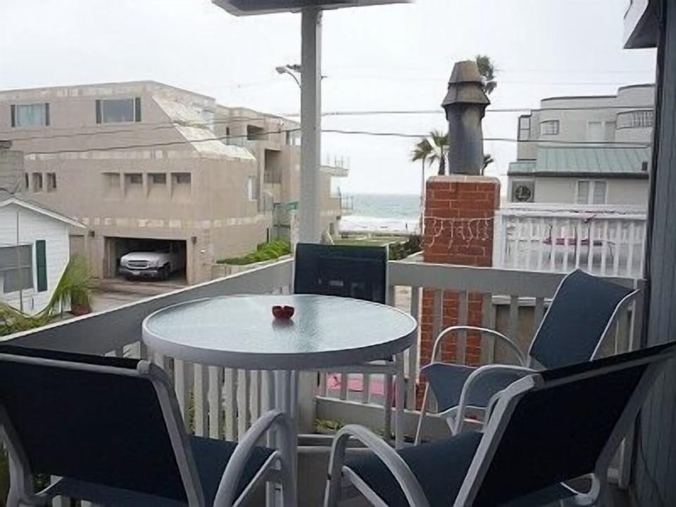 Ocean view deck with bistro table, gas BBQ. Terrific views