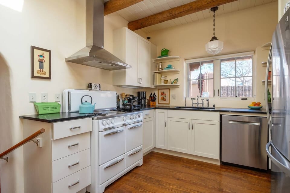 Kitchen featuring antique stove. We also have an small electric oven on the counter top for those looking for an easier alternative.