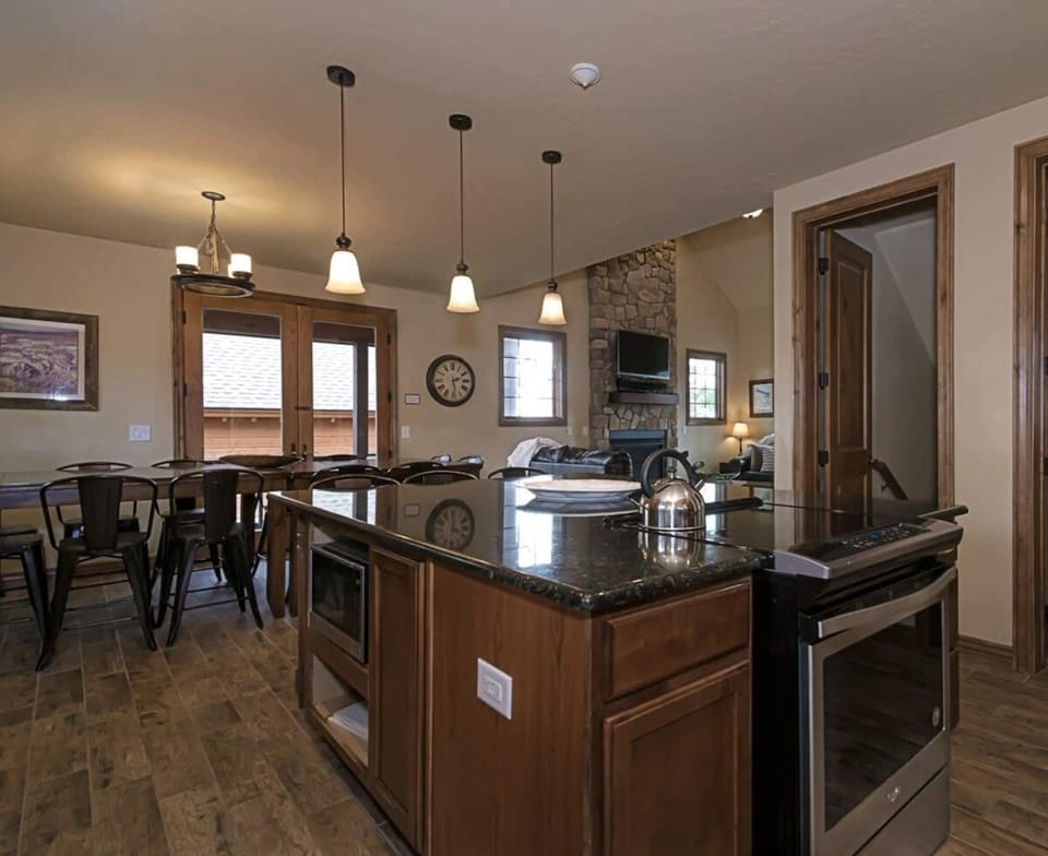 Flowing open floor plan to dining and family room. 