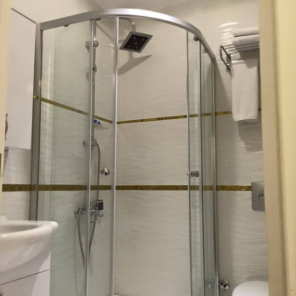 Shower, free toiletries, hair dryer, slippers