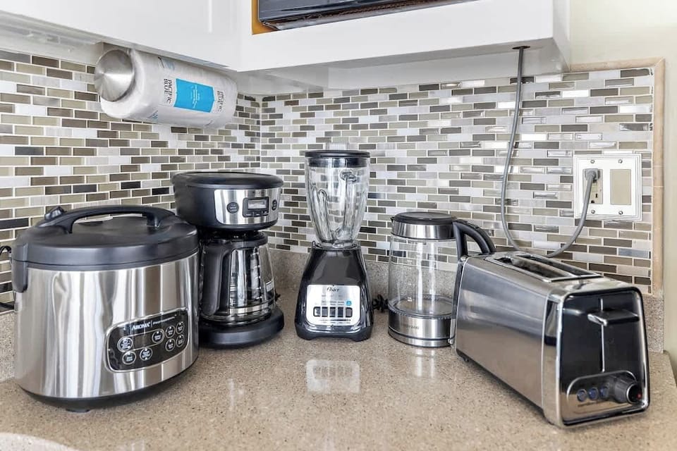 Appliances include rice cooker, coffee maker, blender, kettle, and toaster